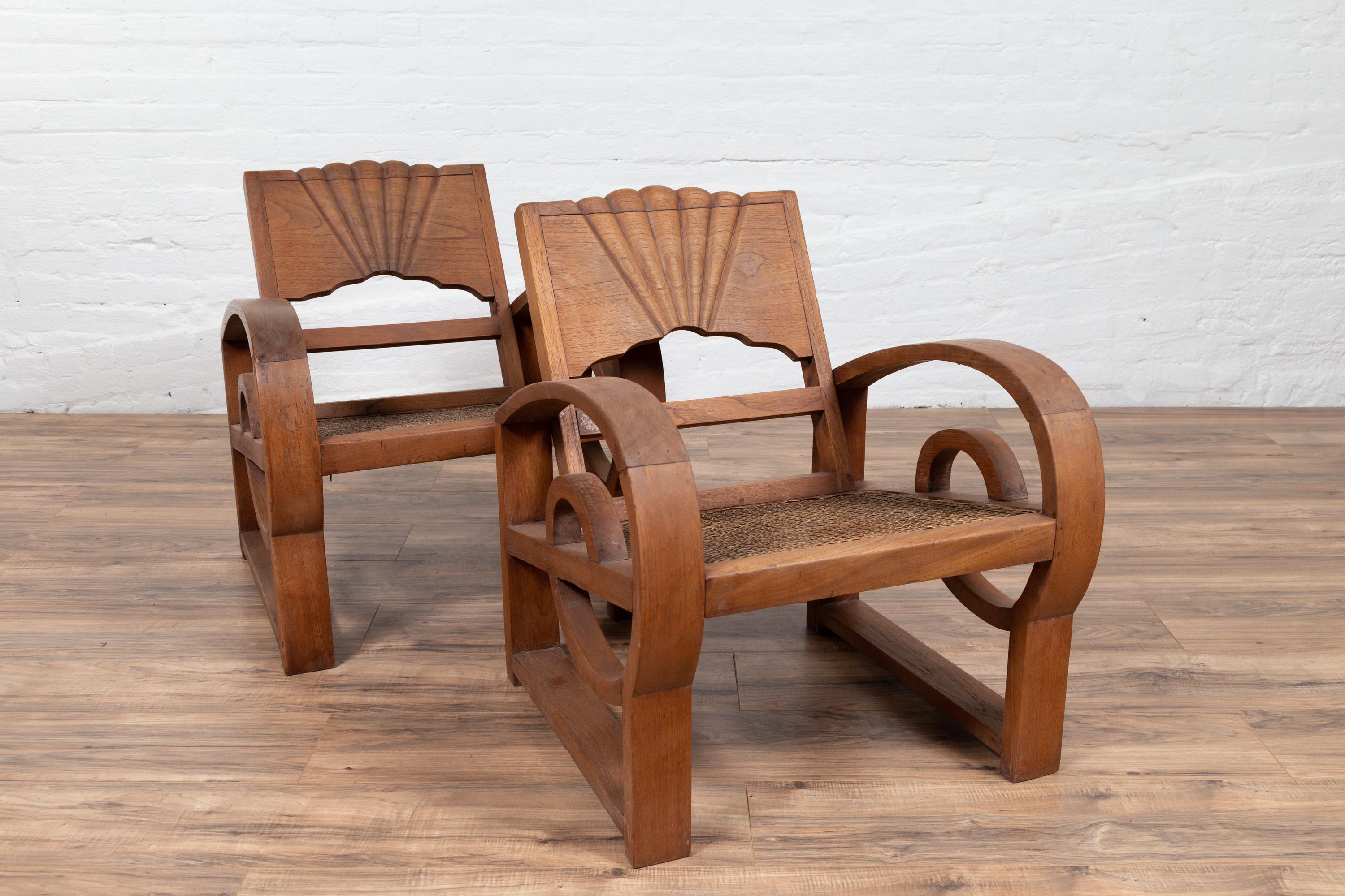Pair of Teak Wood Country Chairs from Madura with Rattan Seats and Looping Arms 7