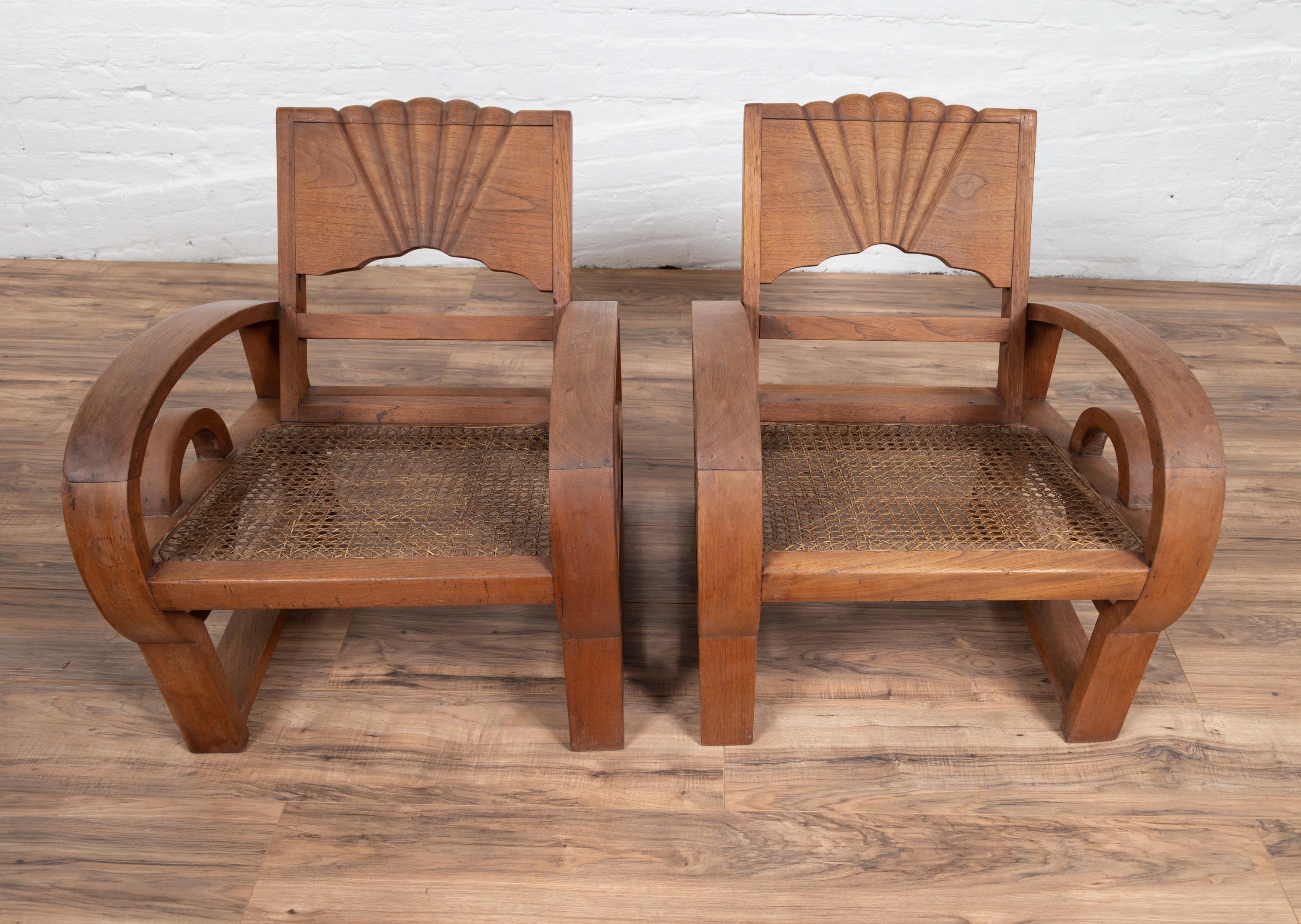Pair of Teak Wood Country Chairs from Madura with Rattan Seats and Looping Arms 9