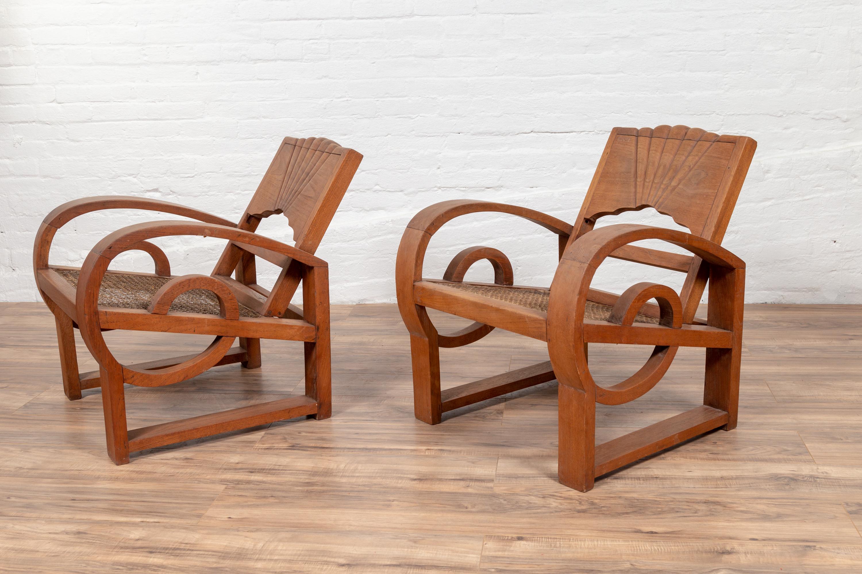 Pair of Teak Wood Country Chairs from Madura with Rattan Seats and Looping Arms 2