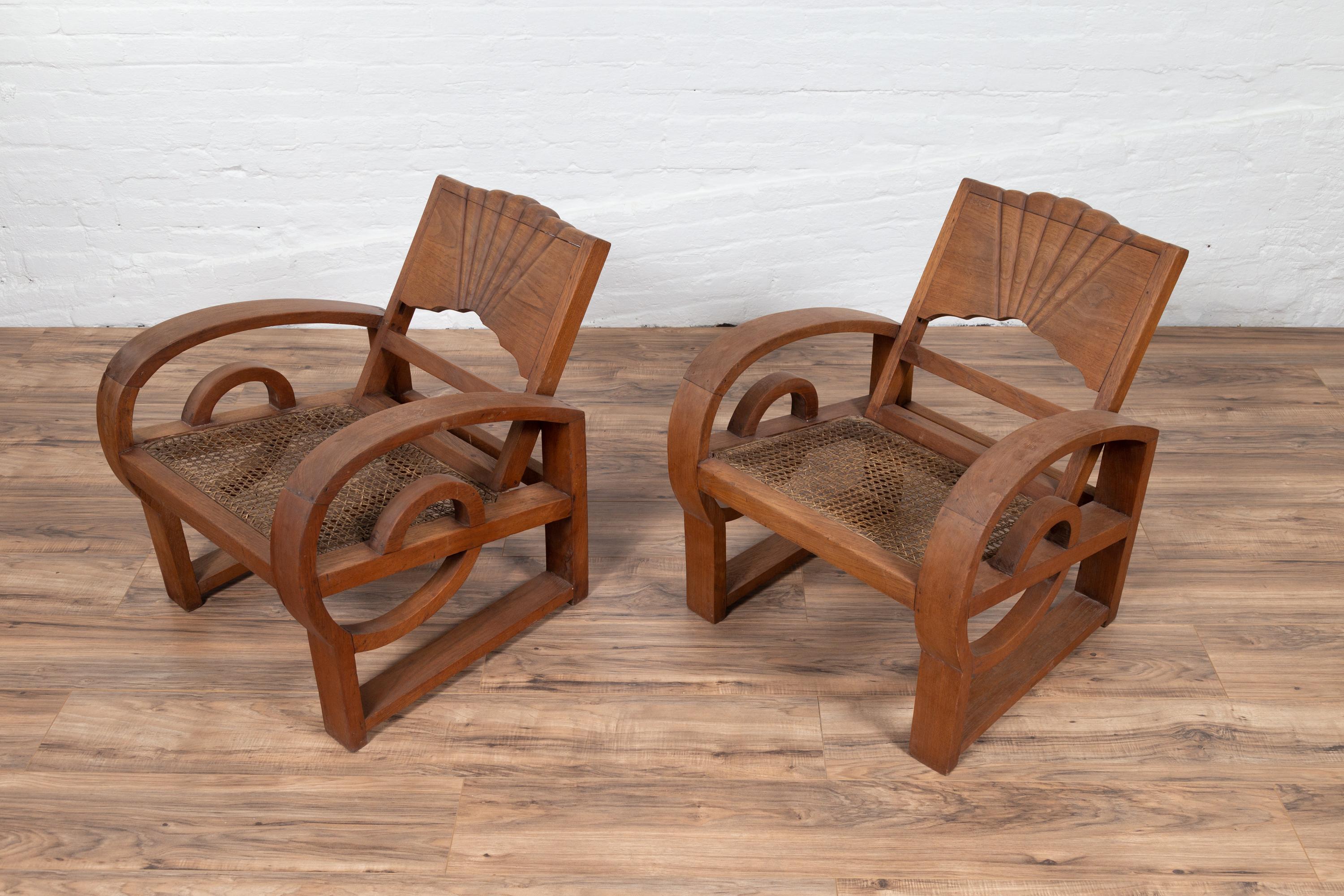 Pair of Teak Wood Country Chairs from Madura with Rattan Seats and Looping Arms 3