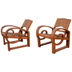 Antique Pair of Teak Wood Country Chairs from Madura with Rattan Seats and Looping Arms