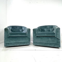 Pair of Teal Velvet Tufted Swivel Chairs