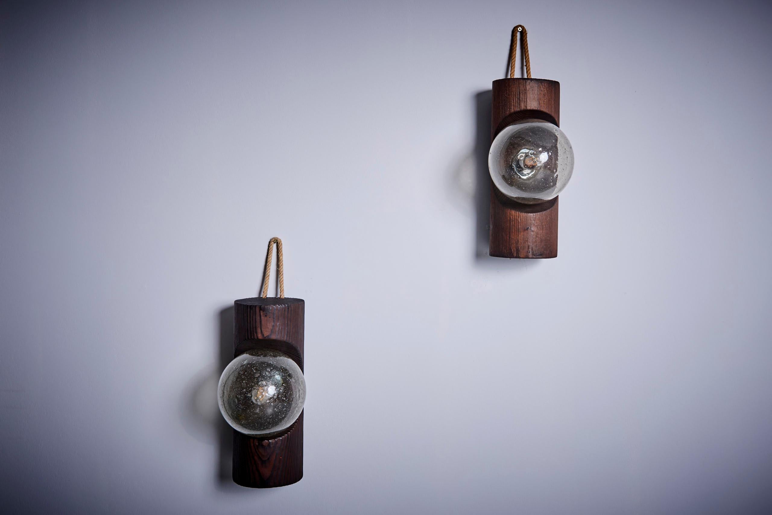 Swiss Pair of Temde Wall Lamps in Wood, Switzerland 1960s  For Sale