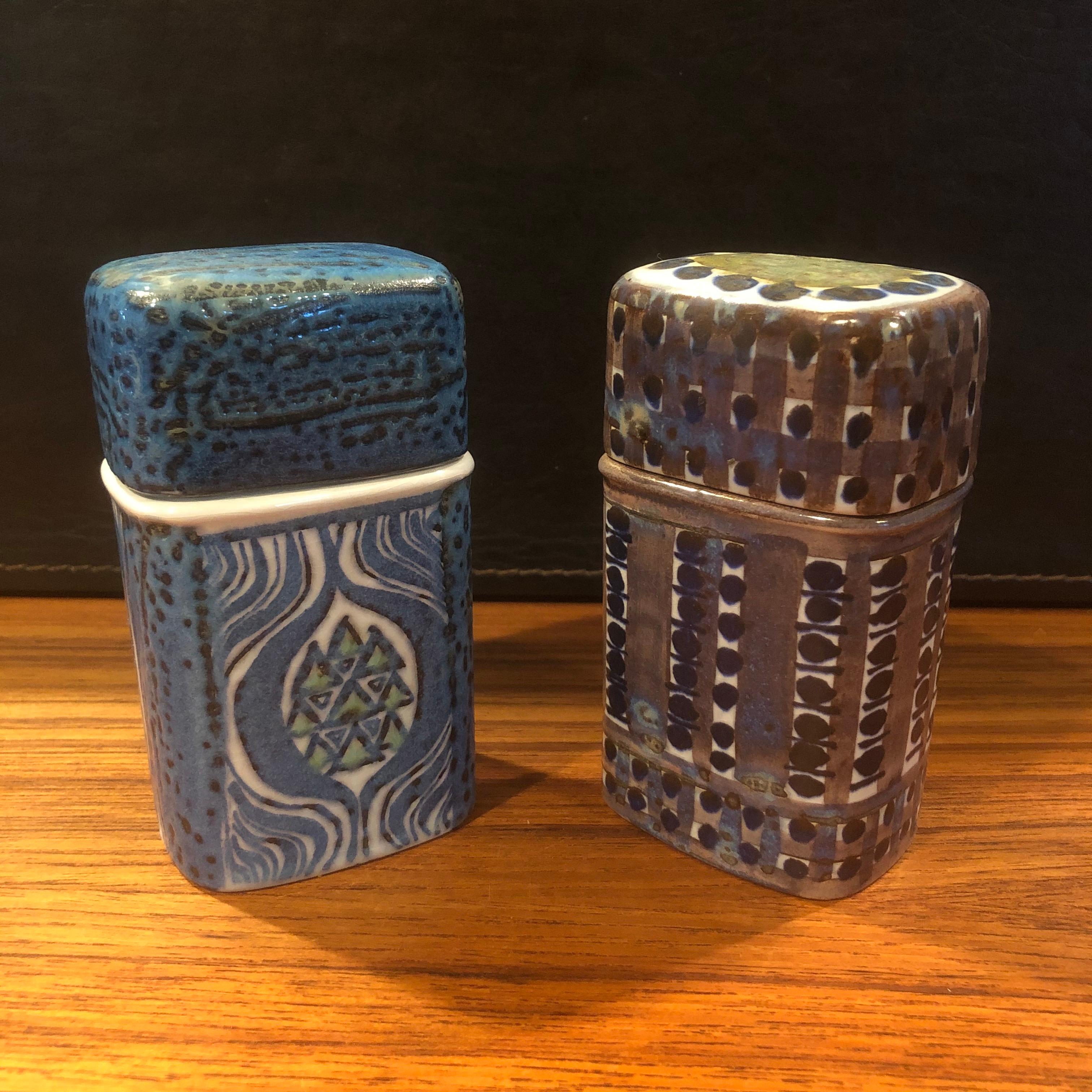 Wonderful pair of Tenera lidded match boxes by Nils Thorsson for Royal Copenhagen, circa 1960s. The blue, grey and white glazed stoneware containers with geometric abstract design was designed by Royal Copenhagen's renowned artistic director, Nils