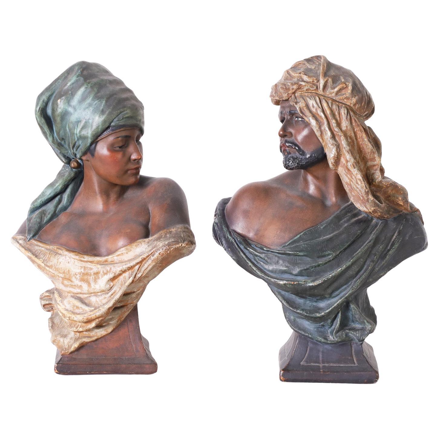 Paire de bustes orientalistes en terre cuite représentant une femme et un homme