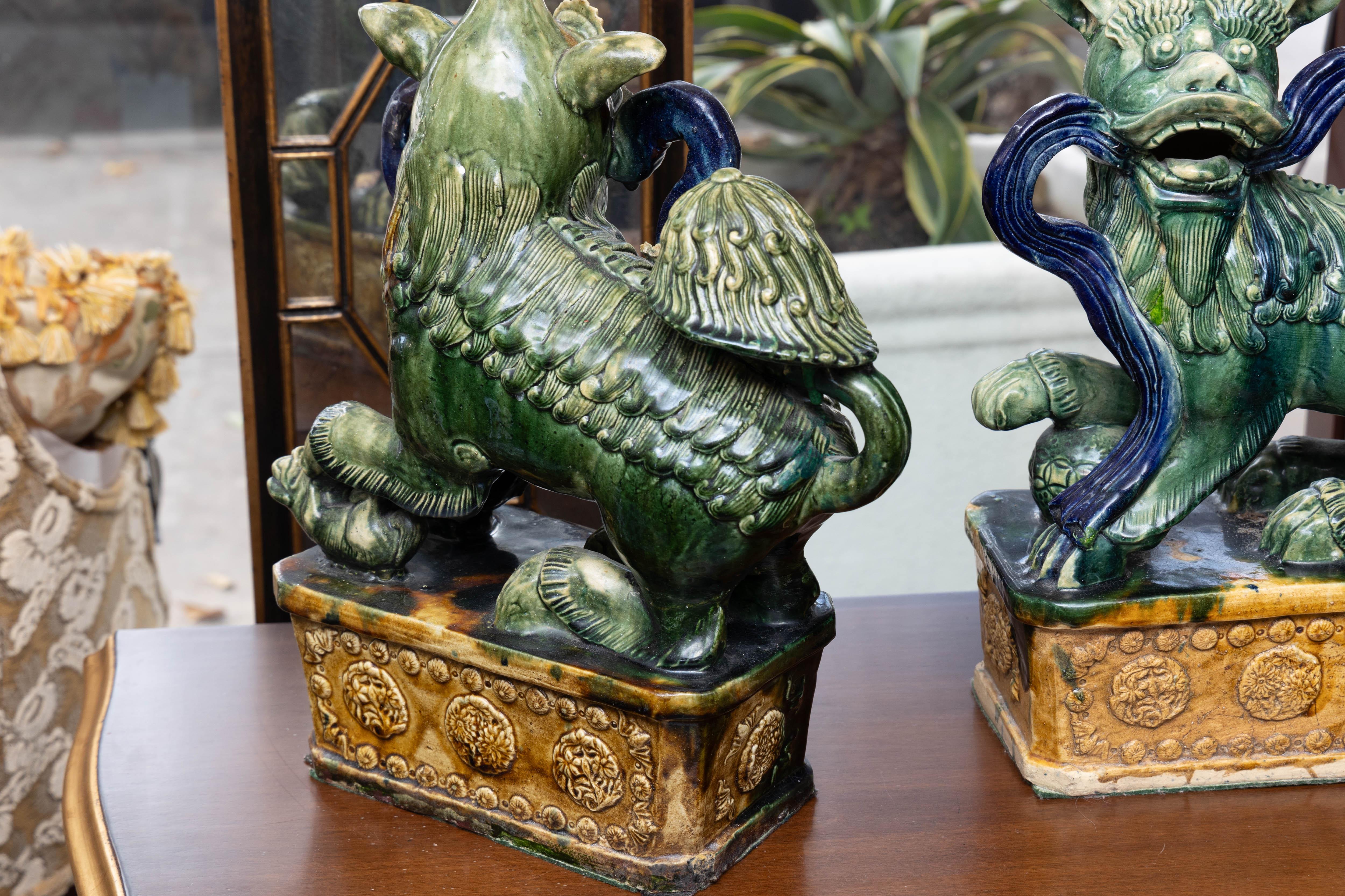 Pair of Terra Cotta Painted and Glazed Foo Dogs For Sale 1