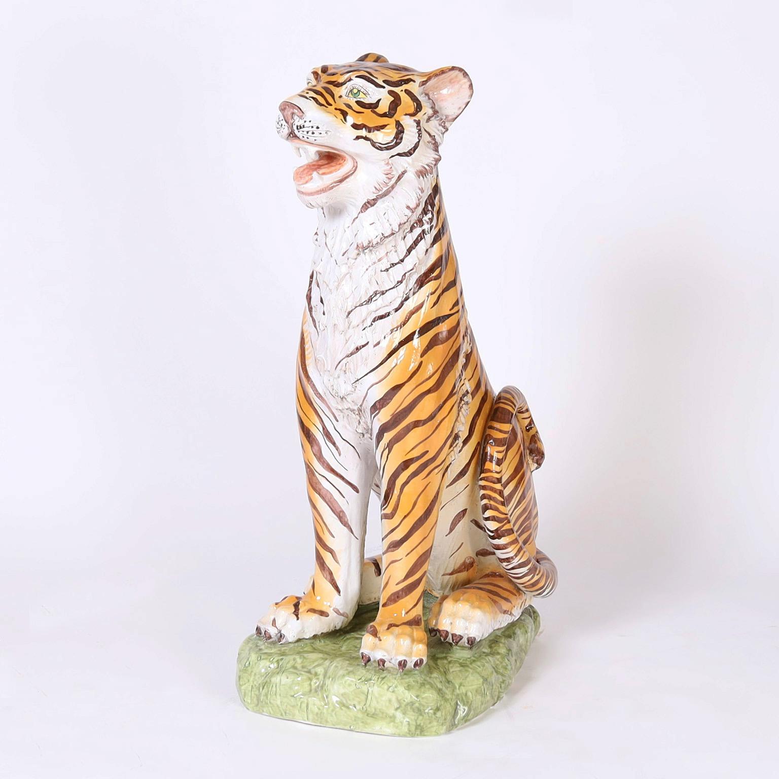 True pair of mid century Italian tigers decorated and glazed with a generous scale and bold presence.