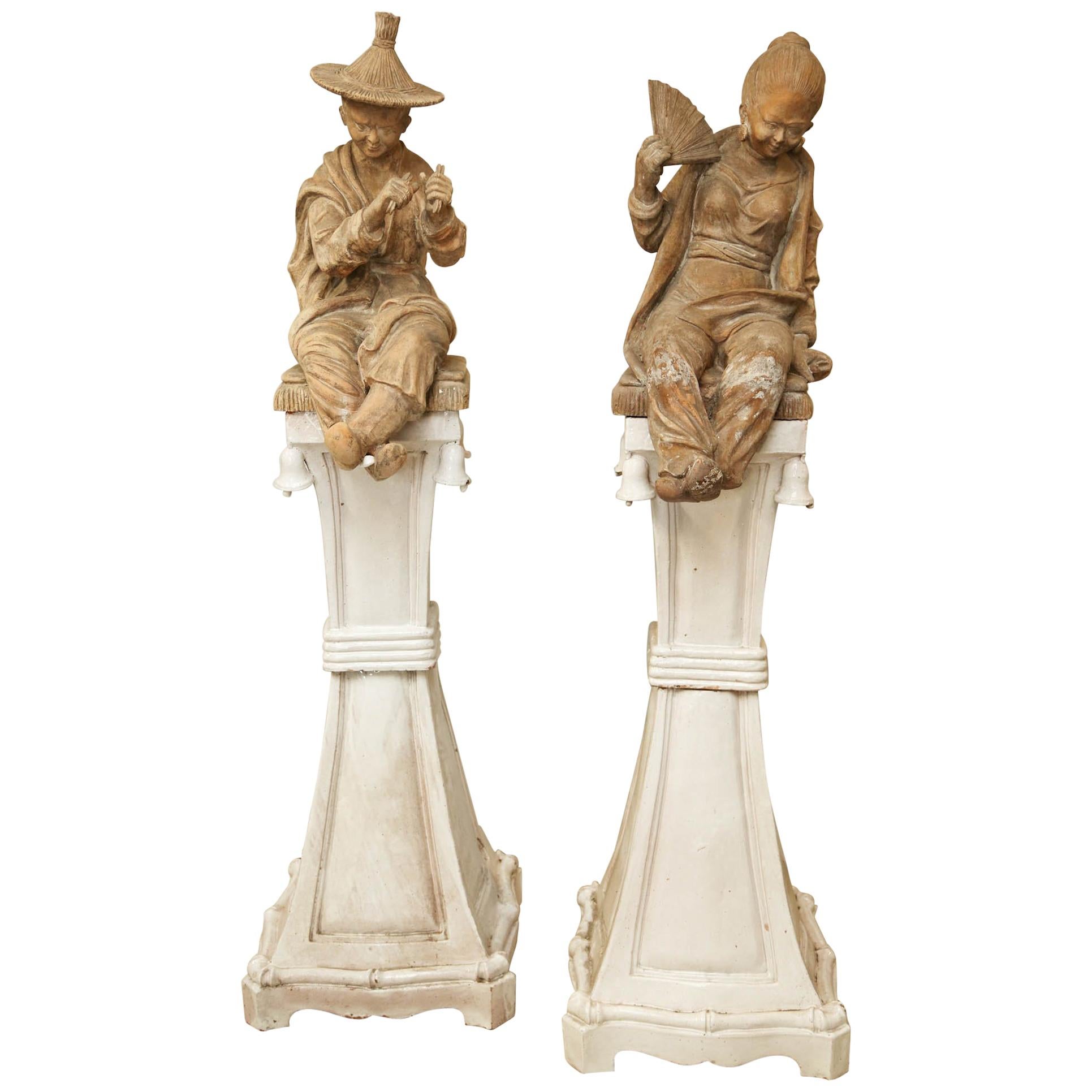 Pair of Terracotta Chinoiserie Figures on Ceramic Columns