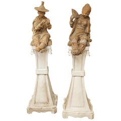 Pair of Terracotta Chinoiserie Figures on Ceramic Columns