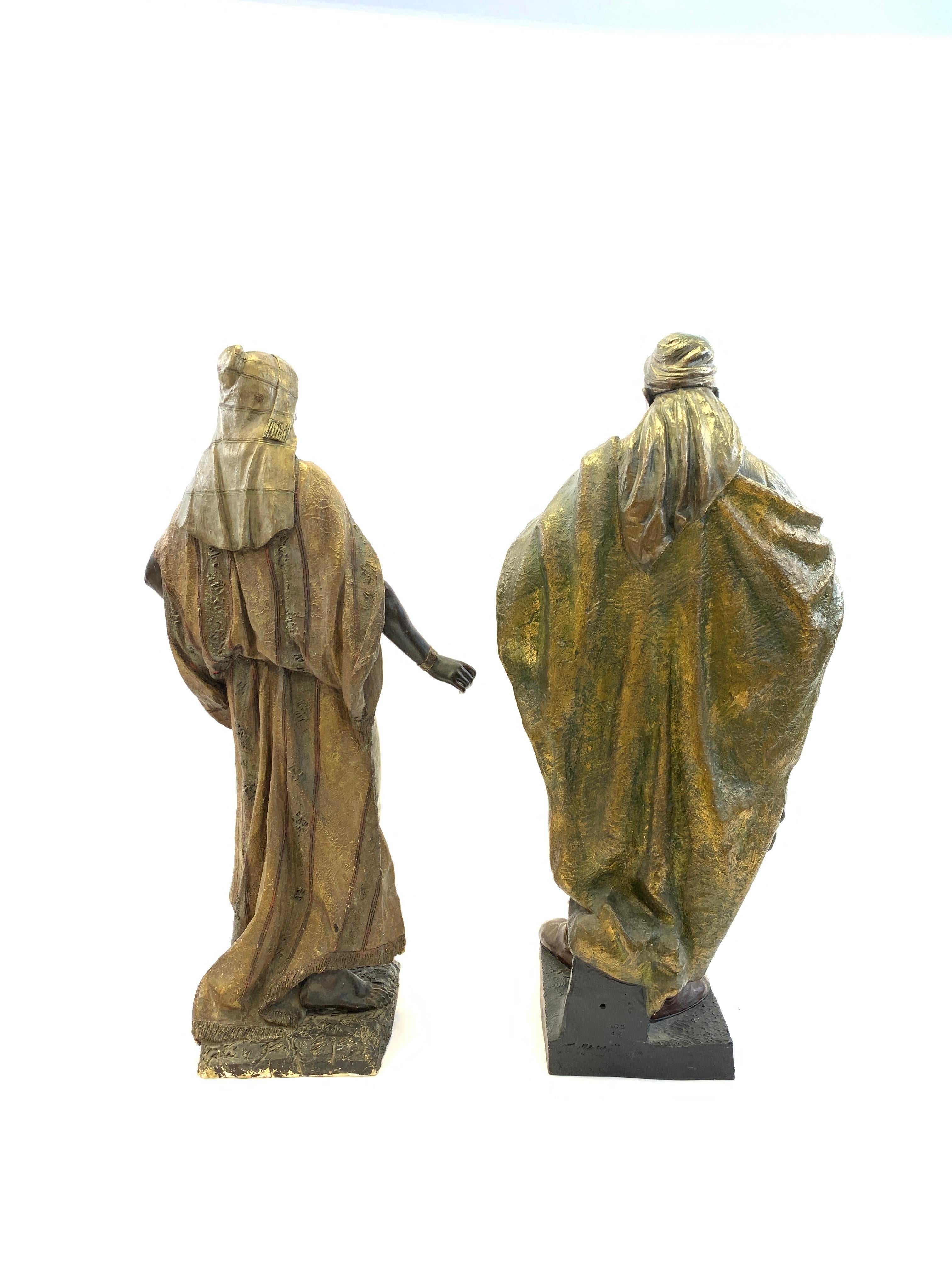 Austrian Pair of Terracotta Figures of an Oriental Lady and Arab Soldier by Goldscheider For Sale