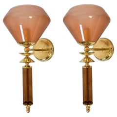 Coppia di appliques in terracotta