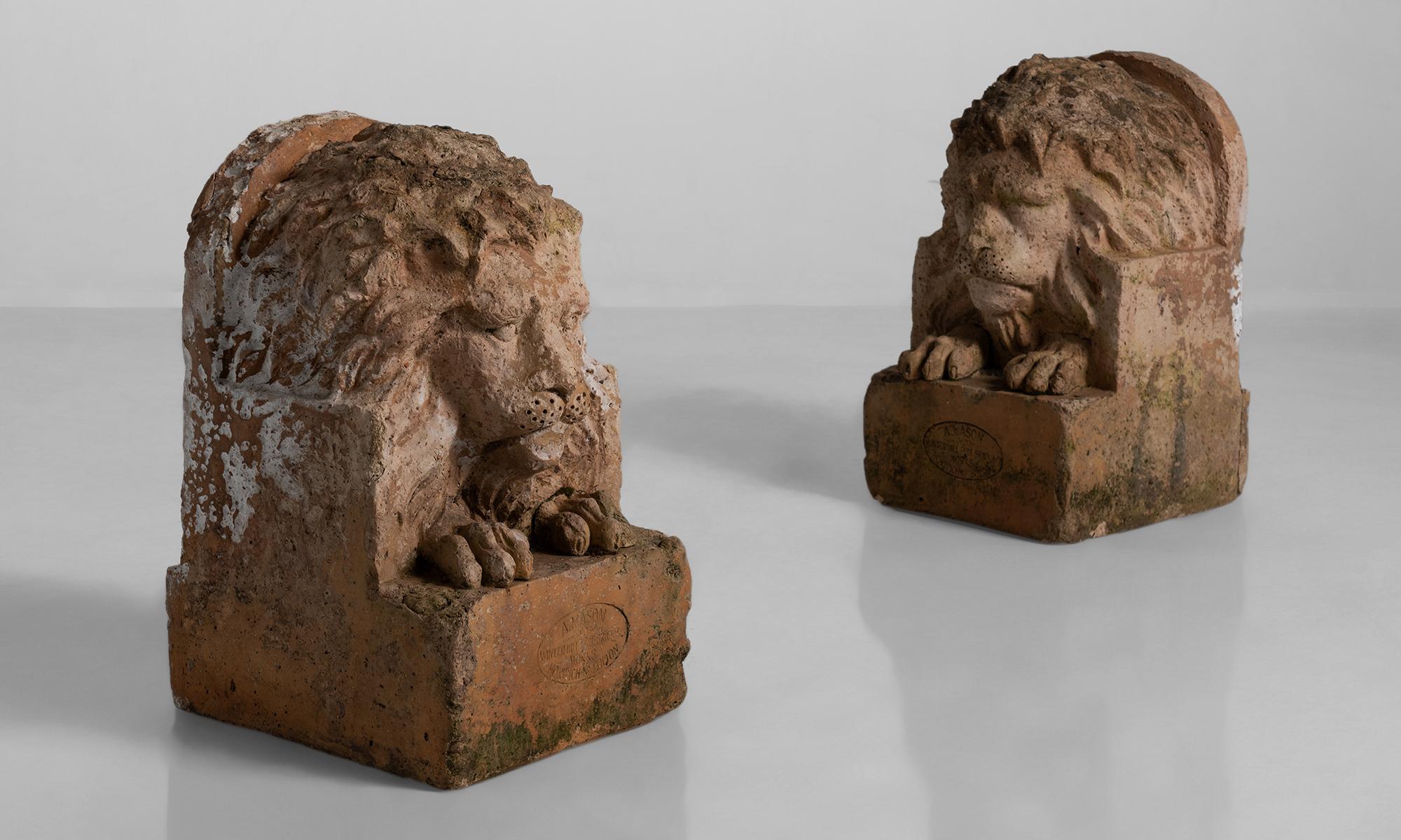 Pair of terracotta lions by Adam Mason & Sons, England, circa 1900

Made in the late Victorian era, and stamped 'A.Mason Winter Hill Fire Bricks Works, Horwich Nr. Bolton’.