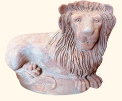 Paire de lions en terre cuite