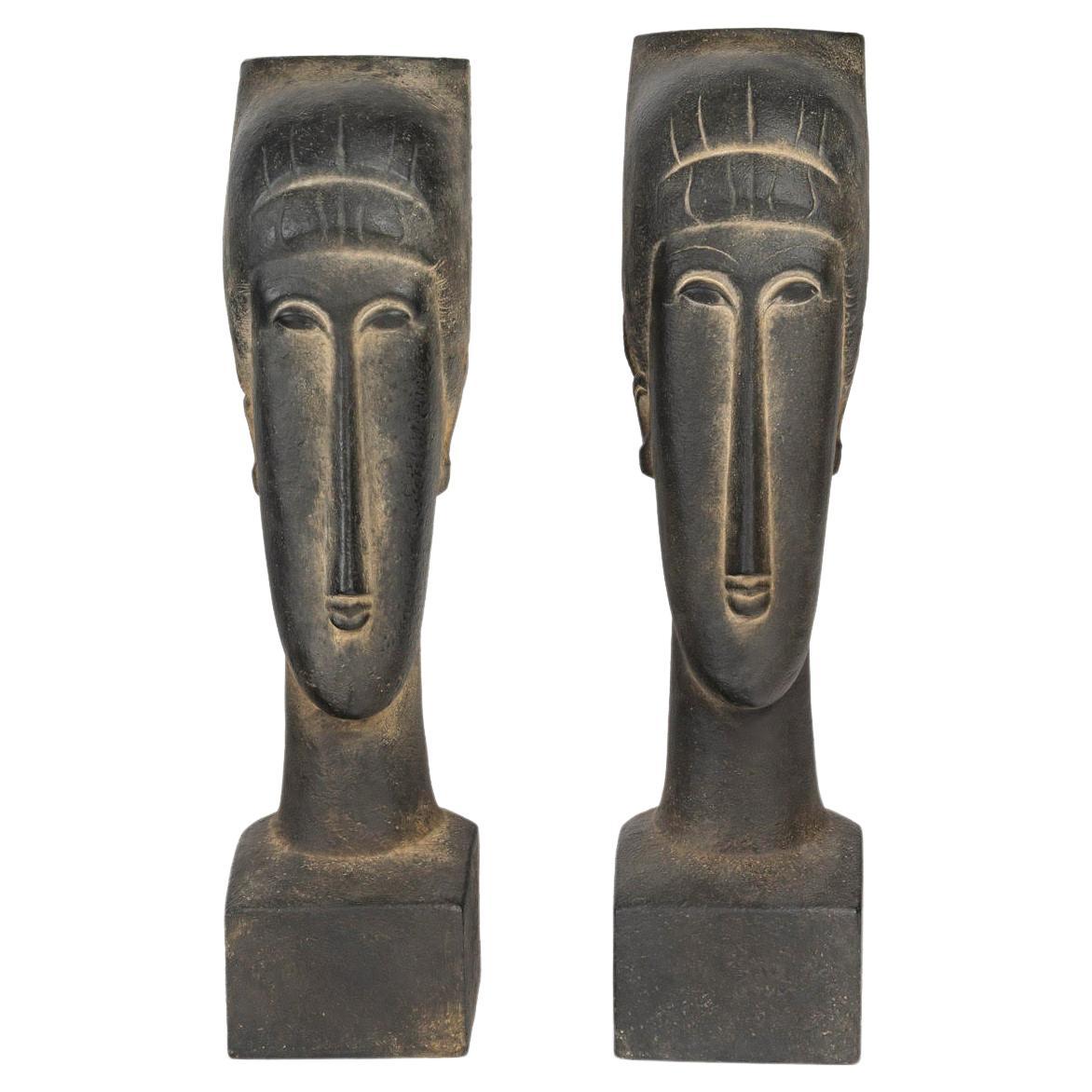 Pair of Terracotta Sculptures in the Modigliani Style, 20th Century.