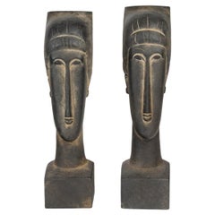 Pair of Terracotta Sculptures in the Modigliani Style, 20th Century.