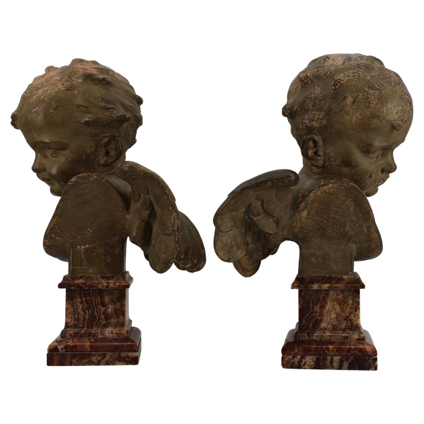 Pair of Terrecotta Winged Busts of Angels