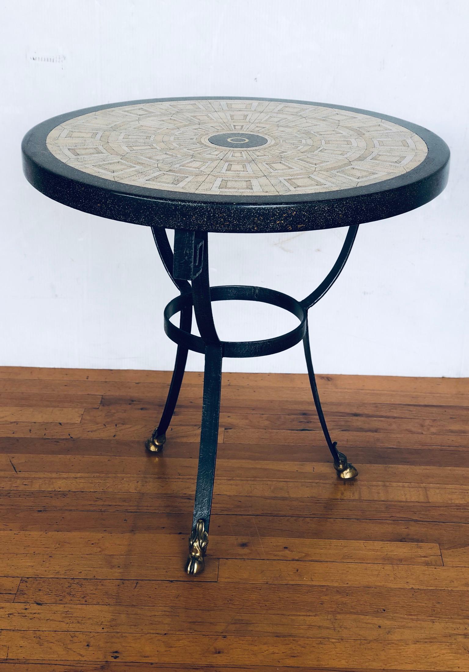 Great pair of Hollywood Regency, neoclassic end/cocktail tables by Maitland Smith, beautiful design top and solid iron base with Greek key accent, and solid brass animal feet, very nice and clean condition.