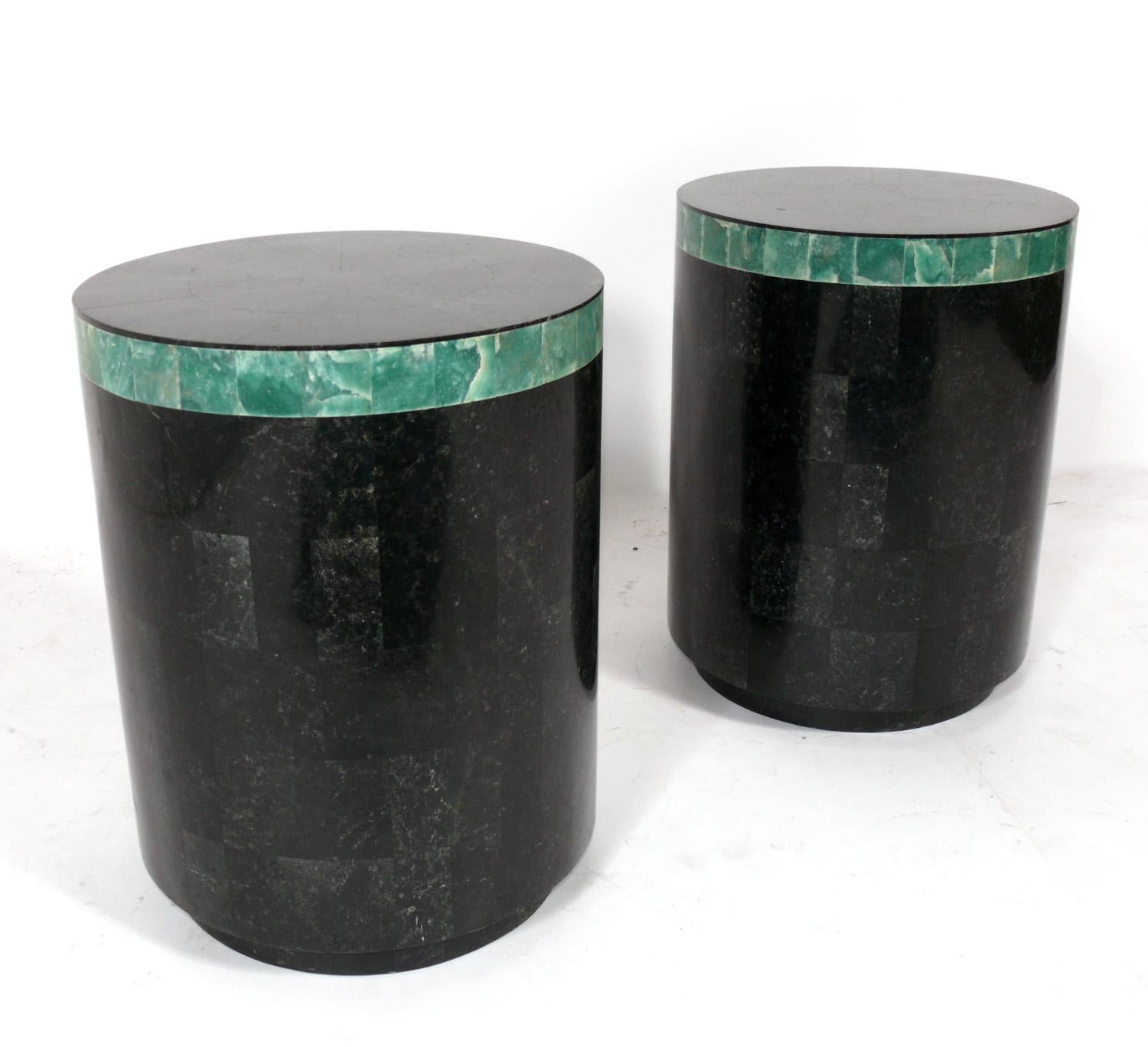 Pair of Tessellated Stone End Tables, in the manner of Karl Springer, American, circa 1980s. They are a versatile size and can be used as end or side tables, or as night stands.