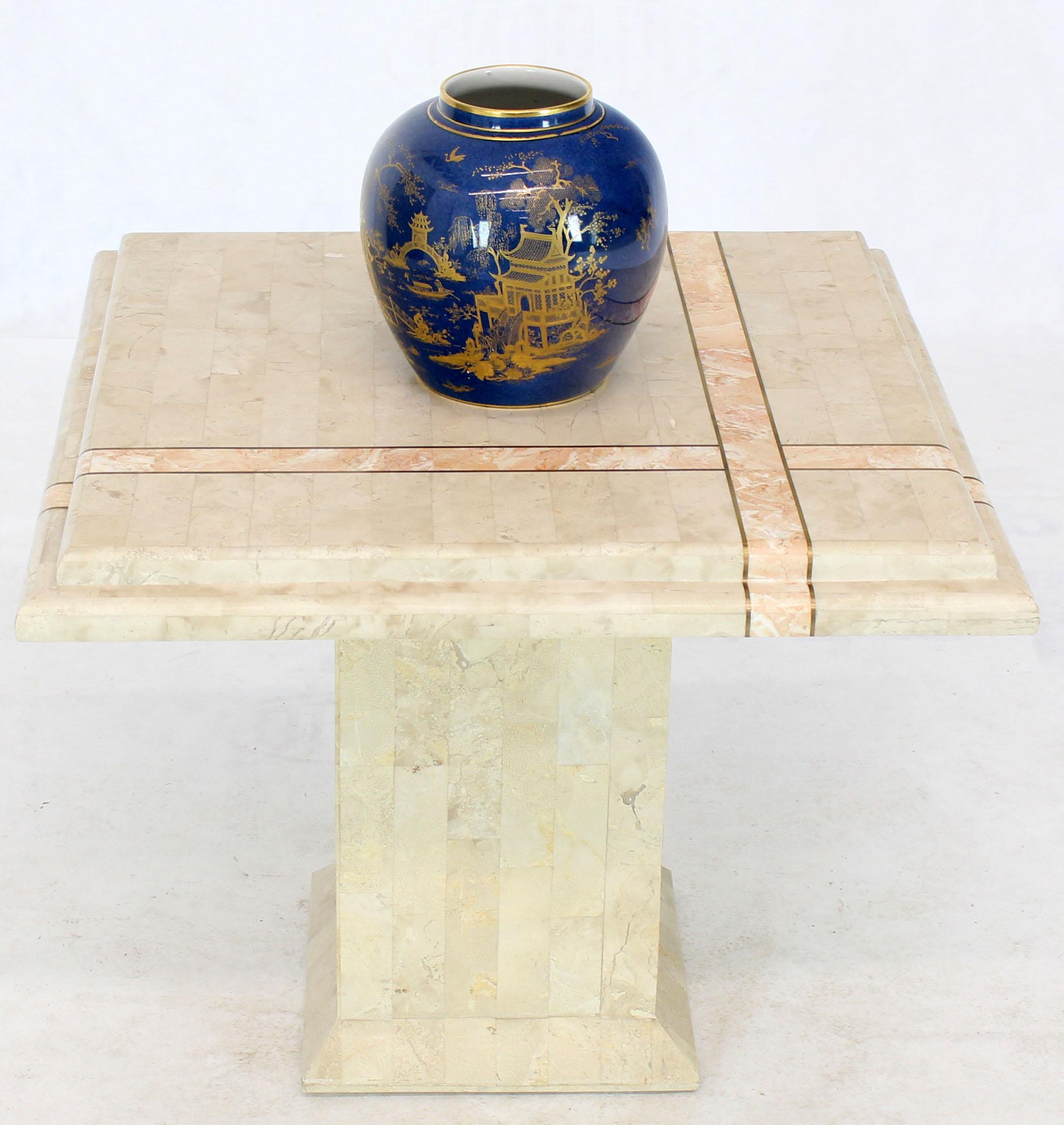 Pair of Mid-Century Modern tessellated stone end side table with brass inlay accents. two-tone pink and cream colors. Attributed to Maitland-Smith.
