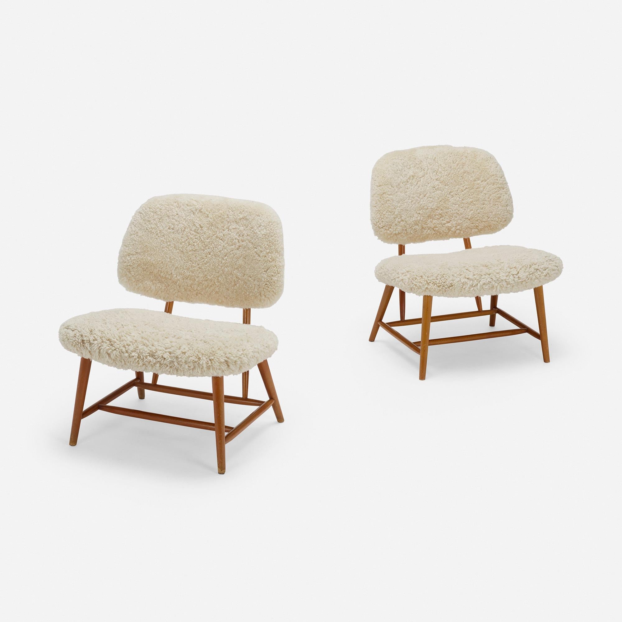 Pair of Teve chairs by Alf Svensson.

Aluminum manufacturer's label to underside of each example ‘Studio Ljungs Industrier AB Bra Bohag’.

Additional information:
Made in Sweden
Material: Birch, faux sheepskin, brass
Size: 25 W × 24 D ×