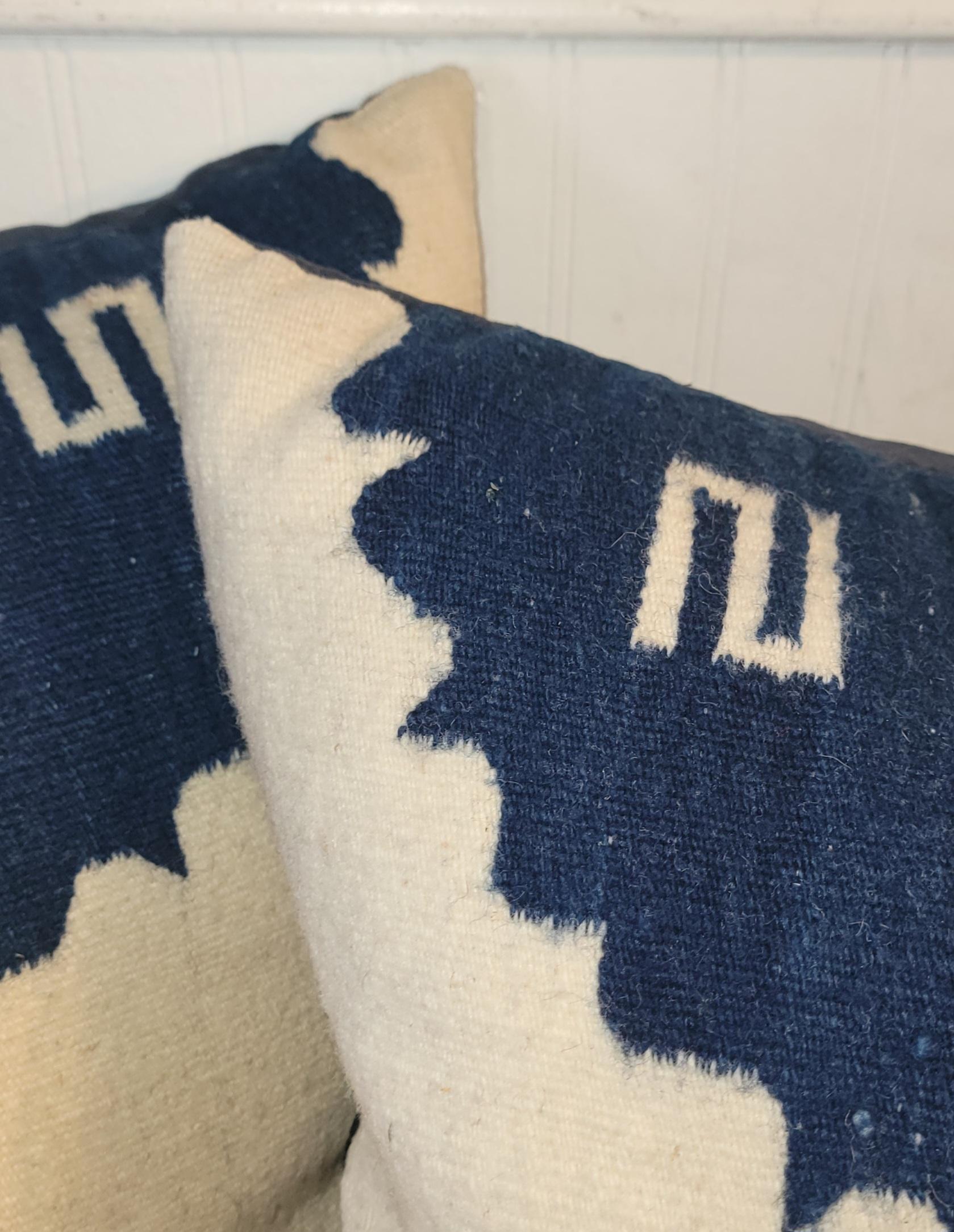 Pair of wonderful Texcoco pillows with a beautiful blue motif and a white antique background to make the blues pop. Great size and a wonderful blue linen backing to go along with it.