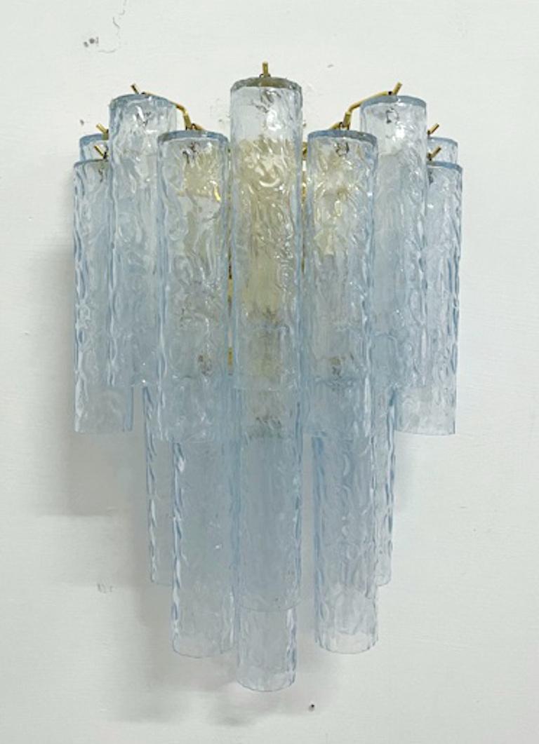 One of a kind pair of wall lights with original vintage Italian textured light blue Murano glass tubes mounted on newly made gold finish metal frames, designed by Fabio Bergomi for Fabio Ltd, made in Italy
2 lights / E12 or E14 type / max 40W