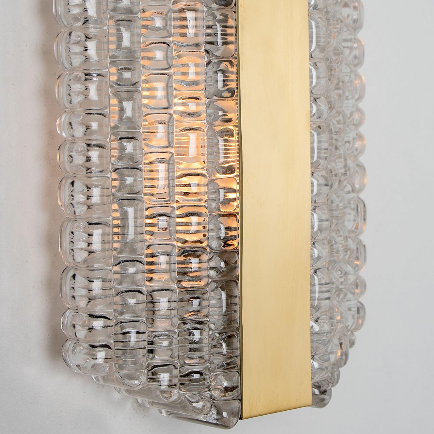 Mid-Century Modern Pair of Textured Clear Glass Wall Lights by Kaiser Leuchten, circa 1970s For Sale