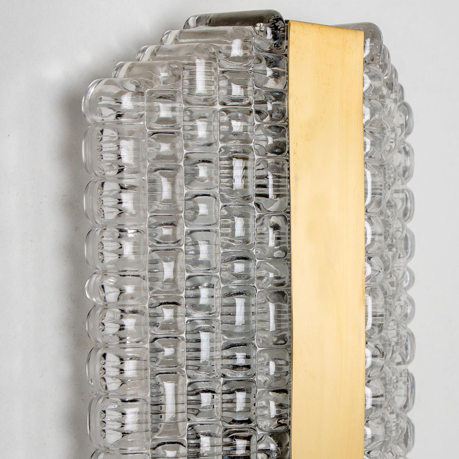 20th Century Pair of Textured Clear Glass Wall Lights by Kaiser Leuchten, circa 1970s For Sale