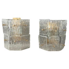 Pair of textured glass wall lights.