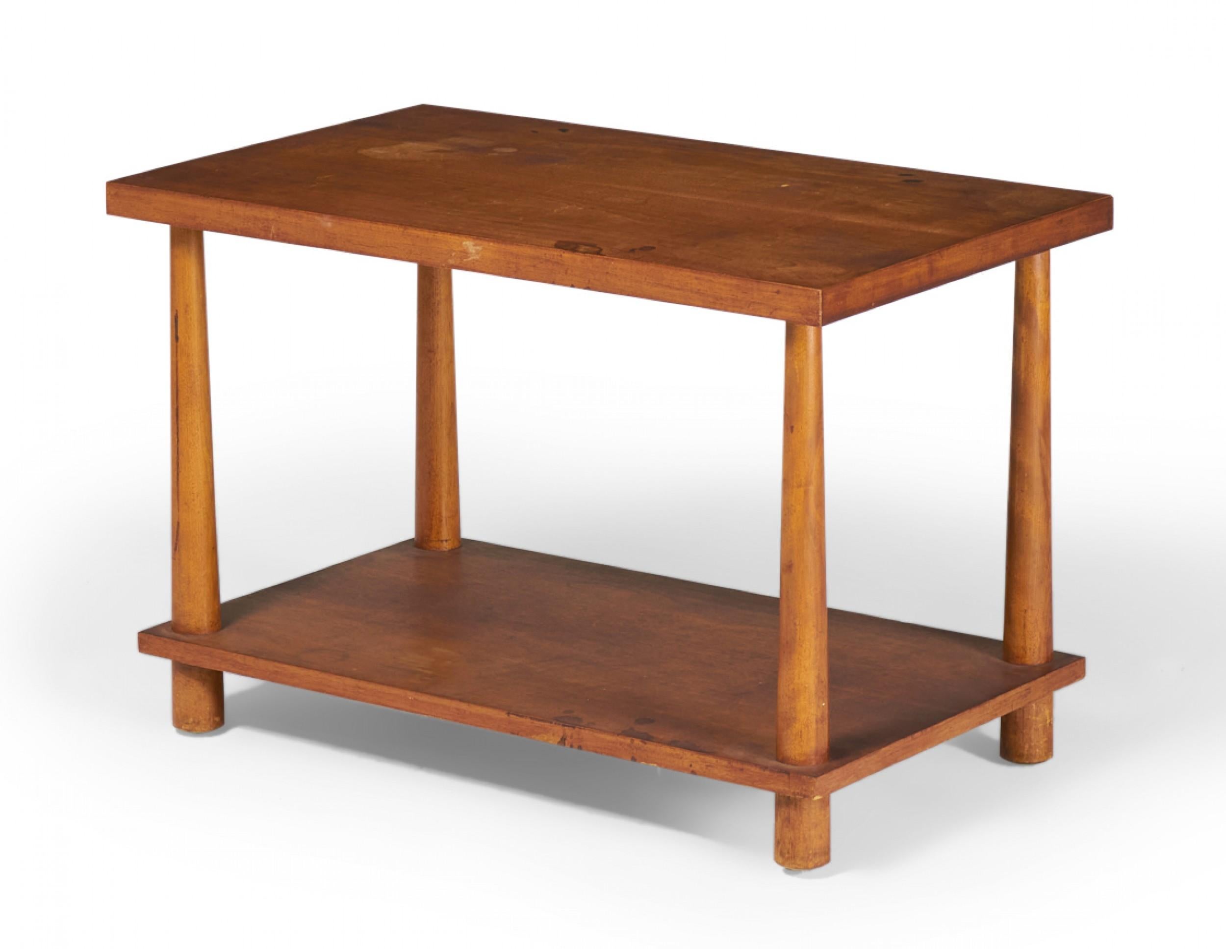 PAIR of American Mid-Century maple end / side tables with a rectangular two-tiered form with reverse tapered dowel legs connecting the lower shelf and tabletop. (T.H. ROBSJOHN-GIBBINGS FOR WIDDICOMB)(PRICED AS PAIR)(Similar tables: DUF0152E)
