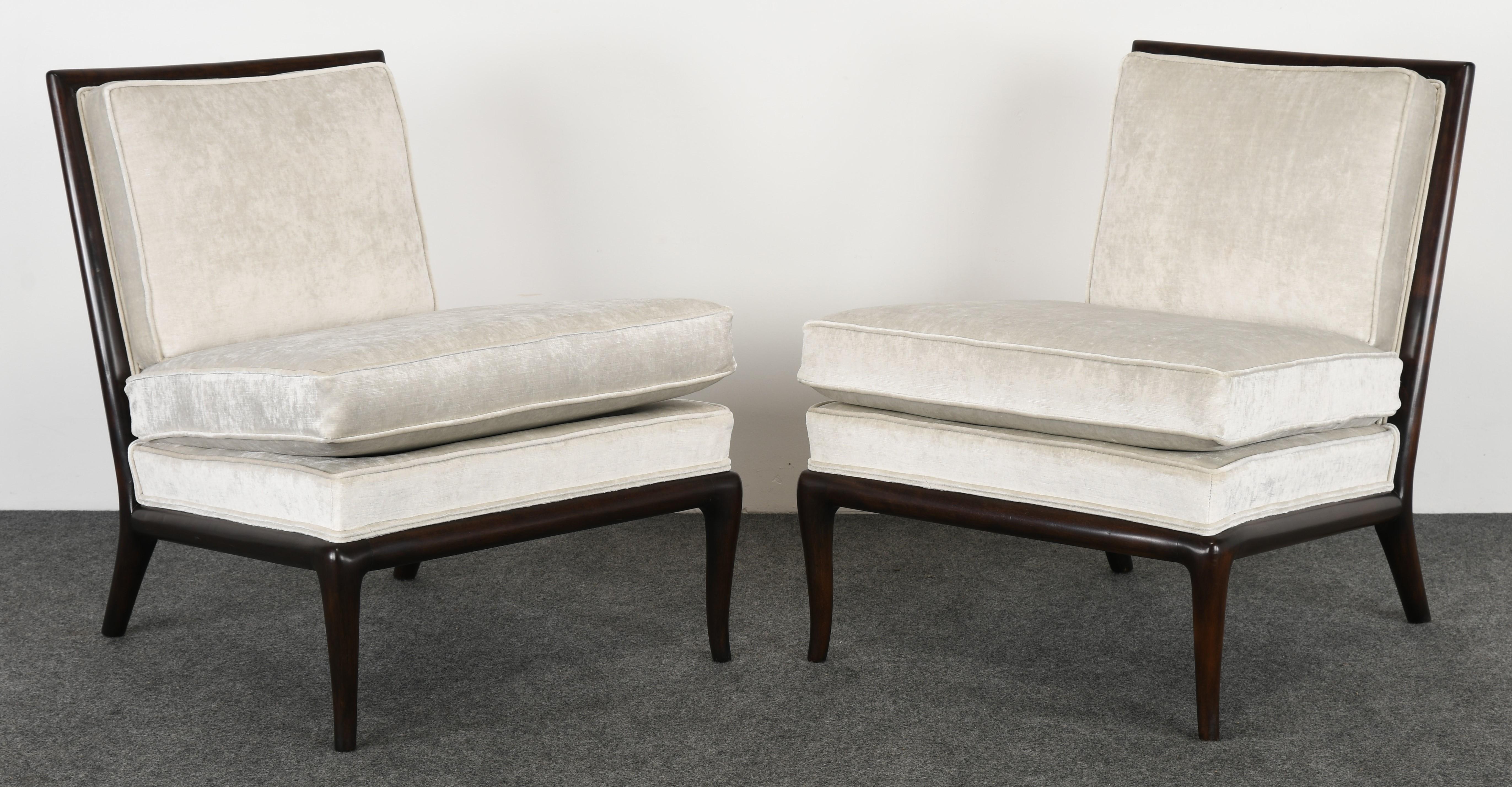 A luxurious pair of T.H. Robsjohn Gibbings slipper chairs for Widdicomb Furniture Company. The chairs are structurally sound and newly refinished wood, new upholstery is recommended. Special pricing on the pair...fabric new but not perfect.