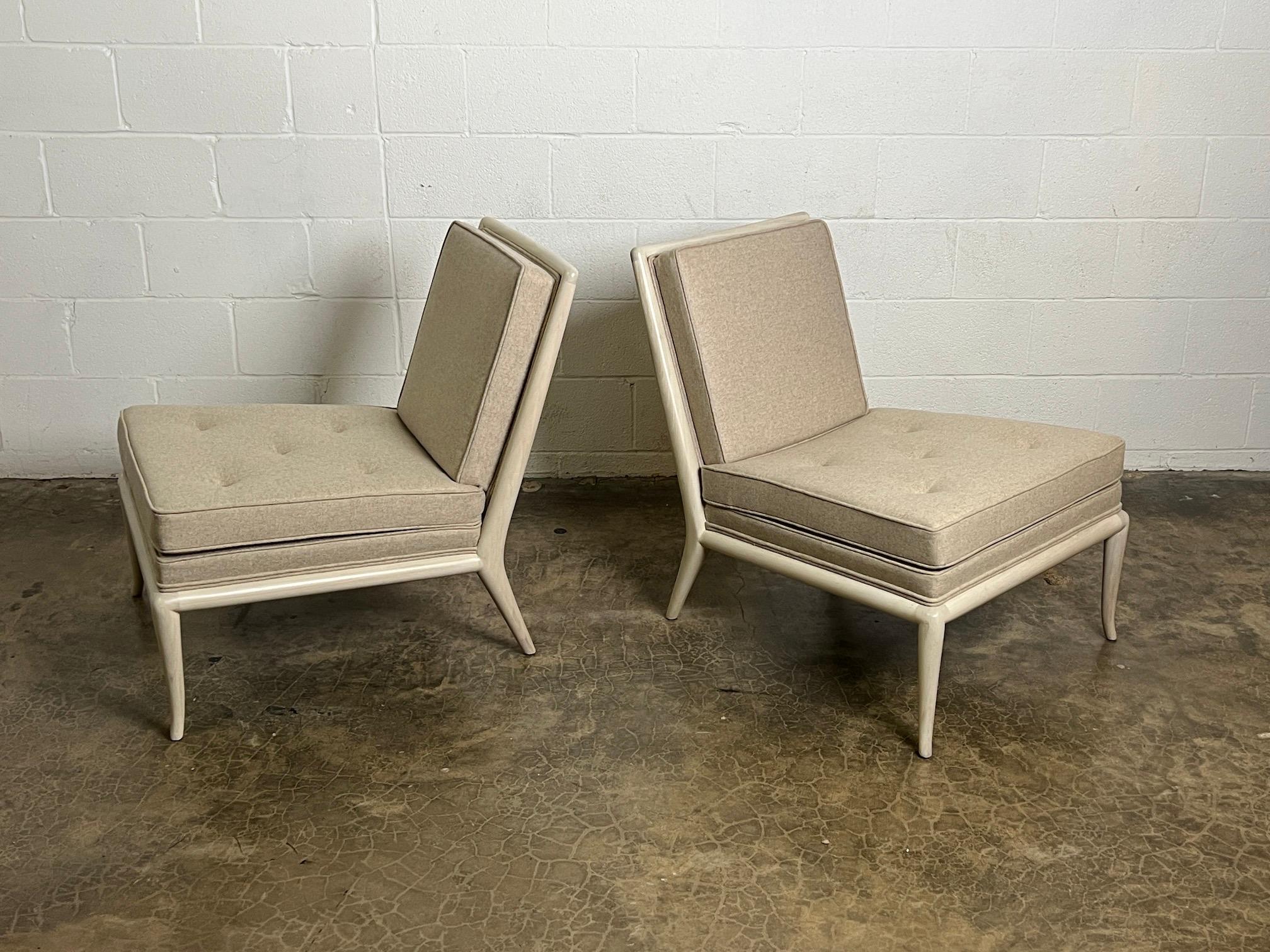 A pair of beautifully restored slipper chairs designed by T.H. Robsjohn-Gibbings for Widdicomb.