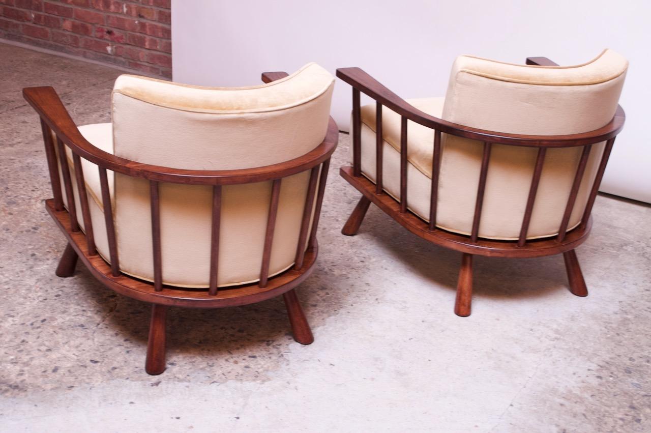 Mid-20th Century Pair of T.H. Robsjohn-Gibbings Stained Walnut Barrel-Back Lounge Chairs