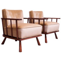 Pair of T.H. Robsjohn-Gibbings Stained Walnut Barrel-Back Lounge Chairs