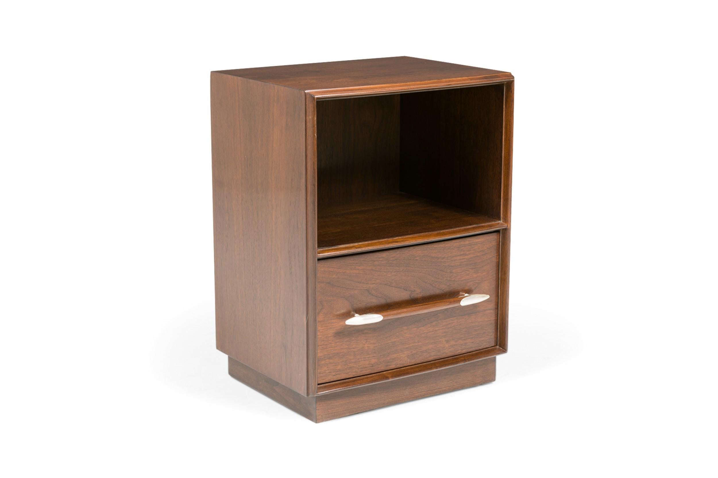 PAIR of American Mid-Century walnut end / side tables with an open compartment above a single lower drawer with a rounded walnut bar drawer pull with tapered brushed chrome caps at either end. (T.H. ROBSJOHN-GIBBINGS FOR WIDDICOMB FURNITURE