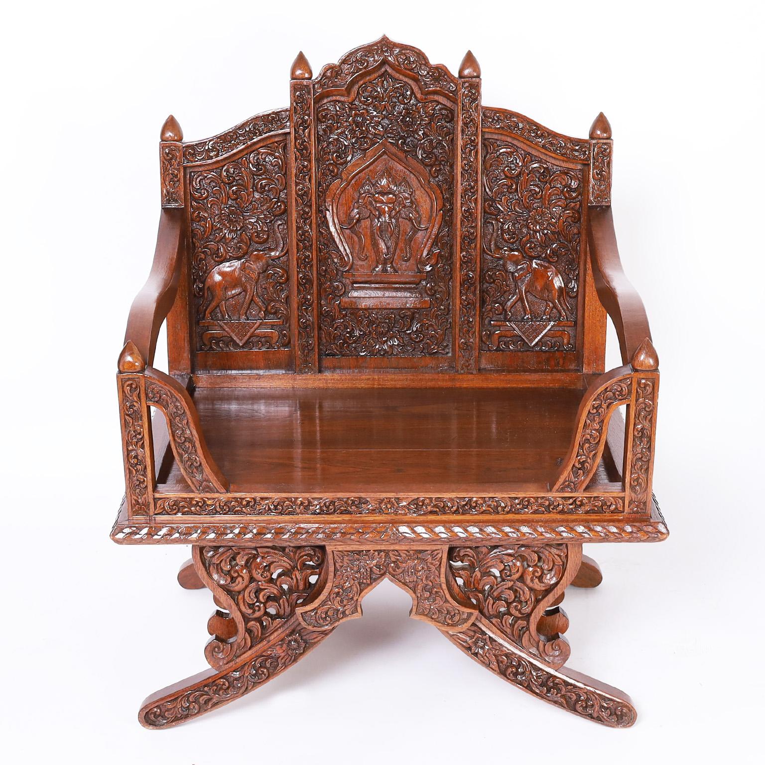 British Colonial Pair of Thai Rosewood Elephant Howdah Saddle Style Chairs For Sale