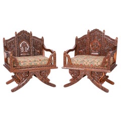 Pair of Thai Rosewood Elephant Saddle Style Chairs