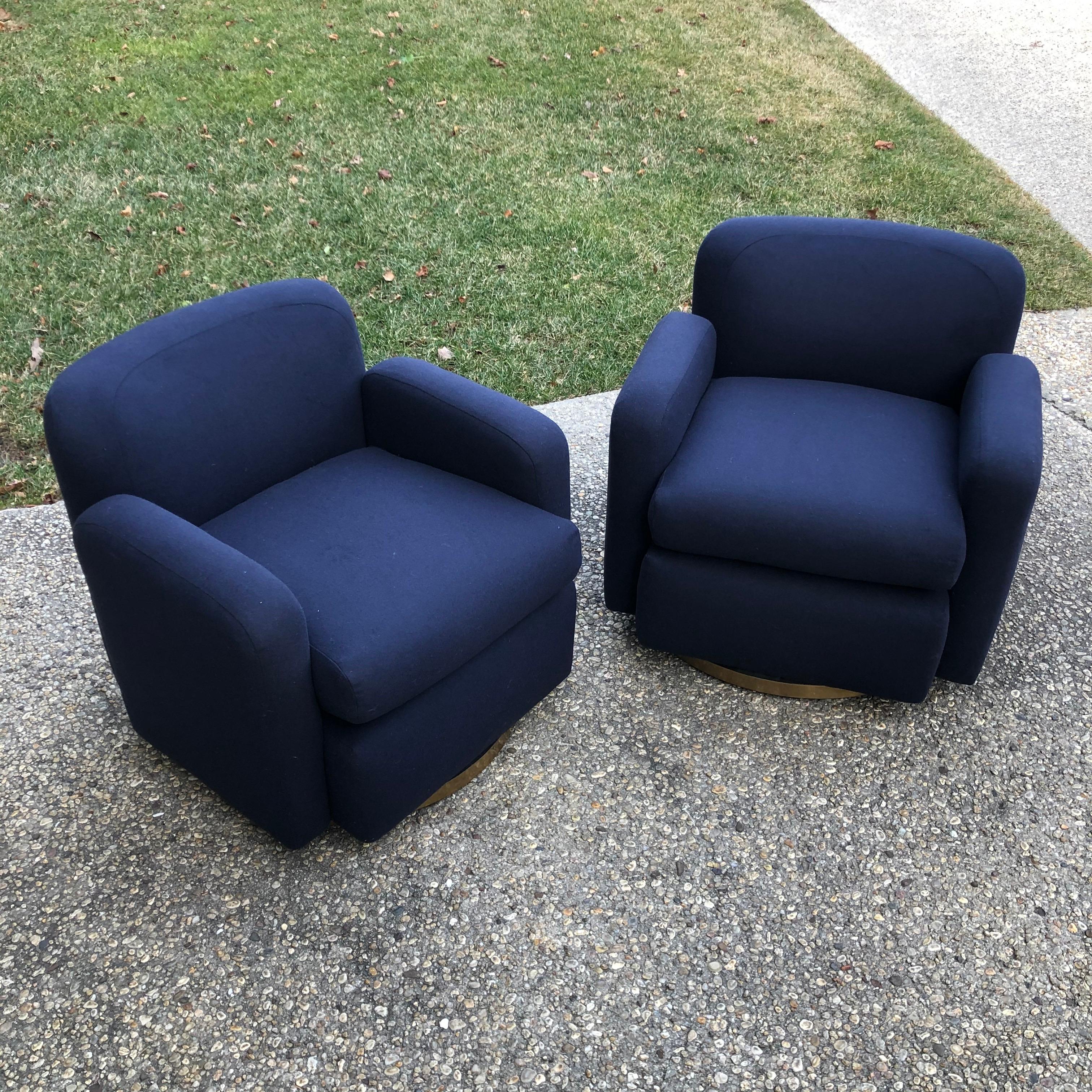 Pair of Thayer Coggin club chairs. Newly reupholstered in dark navy blue wool/ Cashmere. Brass swivel bases work well.
Measures: Seat height 16.5