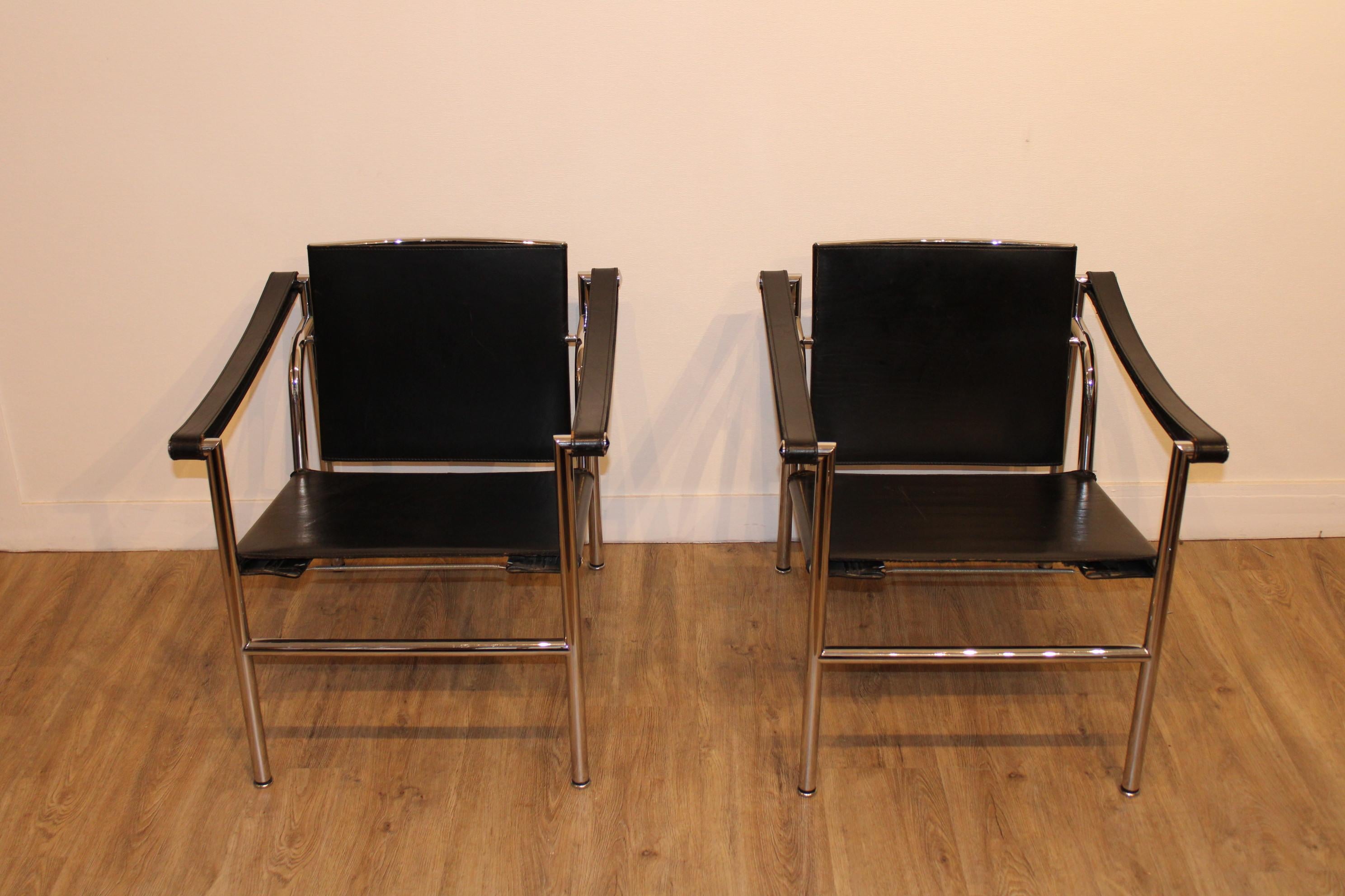 Pair of the LC1 design armchairs
Tilt back armchairs
by Le Corbusier, Jeanneret and Perriand
Edited by Cassina, from 1965

Good vintage conditions (metal pitted, leather wear on the armrests : see photos).