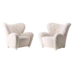 Pair of The Tired Man Lounge Chair-Sheepskin Moonlight/Oak by Flemming Lassen