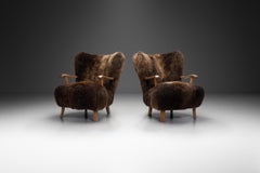 Pair of Theo Ruth Lounge Chairs Upholstered in Sheepskin, Netherlands 1960s
