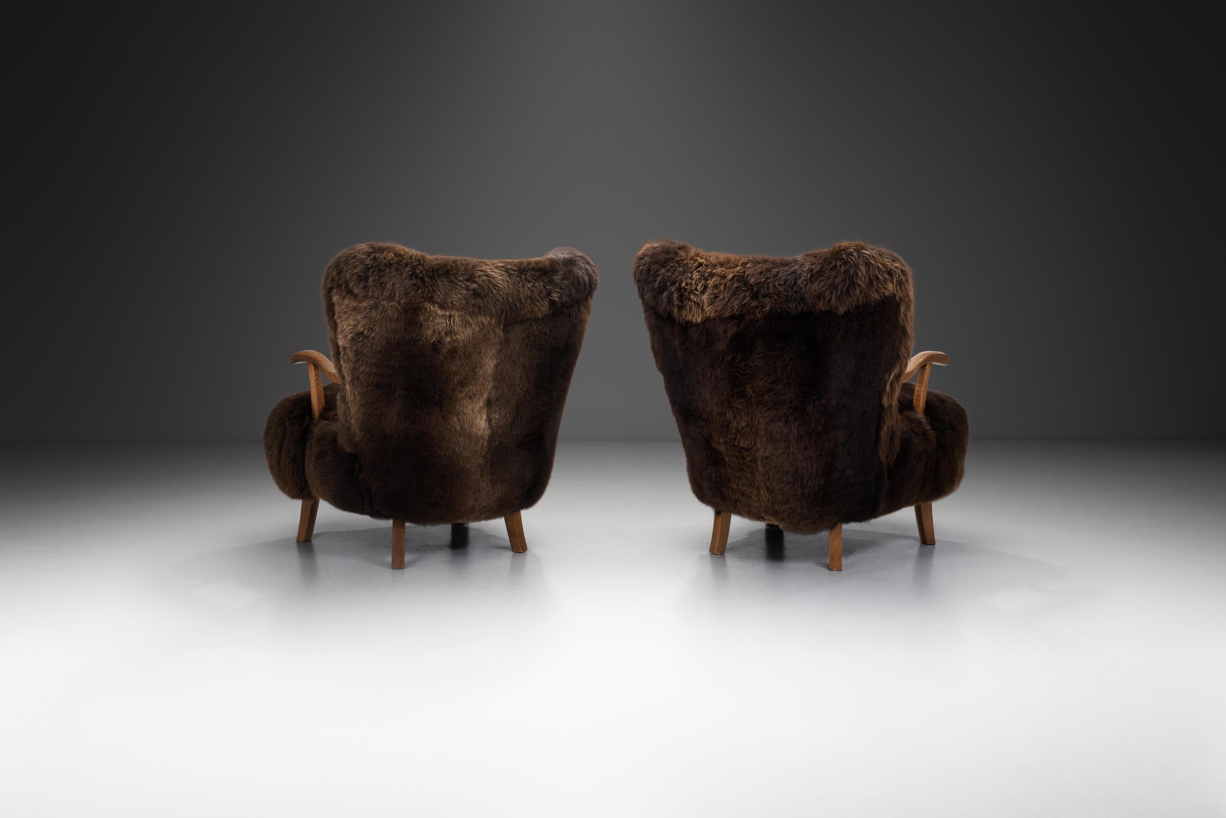 Dutch Pair of Theo Ruth Lounge Chairs Upholstered in Sheepskin, Netherlands 1960s