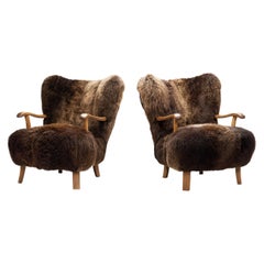 Pair of Theo Ruth Lounge Chairs Upholstered in Sheepskin, Netherlands 1960s