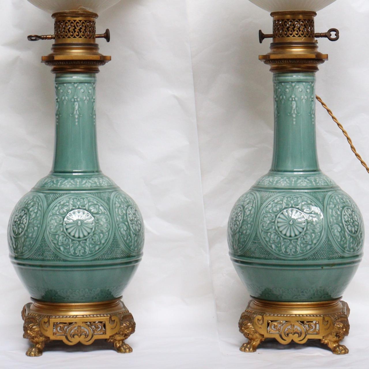 Theodore Deck ( 1823-1891).
A pair of gilt-bronze mounted theodore deck faience celadon-ground vases, mounted as lamps.
Each decorated in the Chinese taste, with flower-head medallions within foliate scrollwork.
Very fine Ormolu mounts quality and