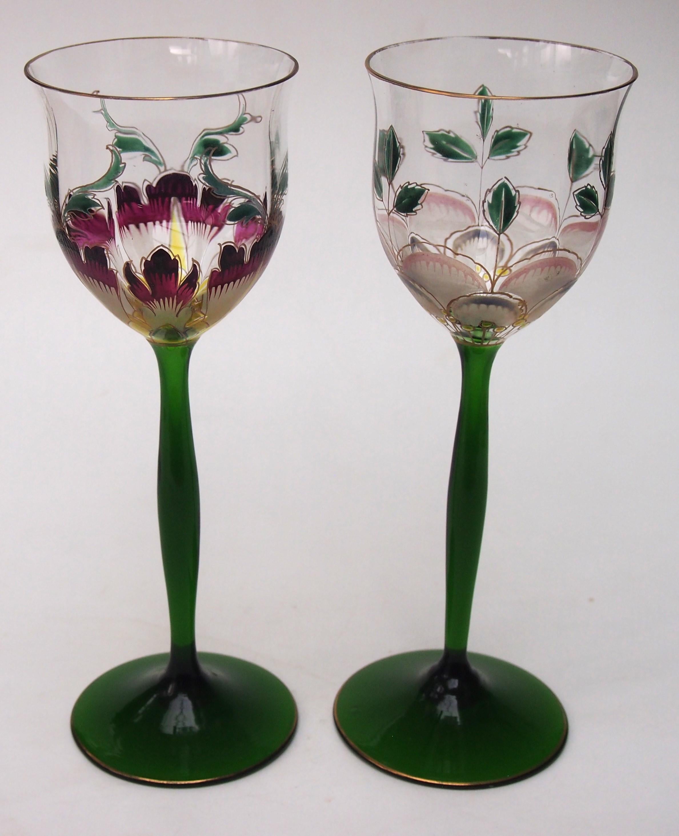 Superb Theresienthal matched pair of large enamelled flower wine glasses, each has a green foot and shaped green stem with different flower patterns to the large bowl. These are well documented in the Theresienthal book - the shape for both is