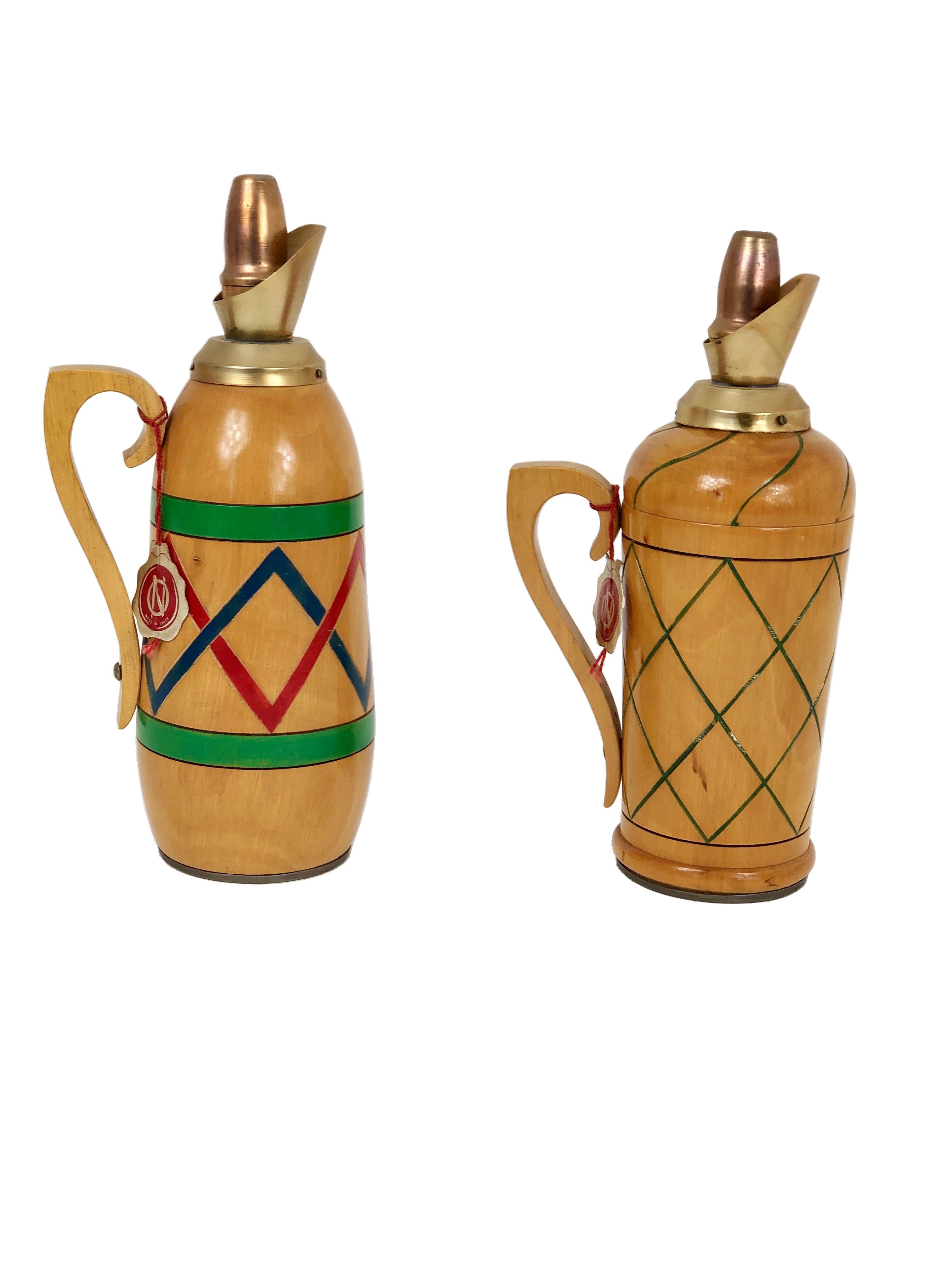 Two vintage pitchers in wood featuring handles in Art Decò style, with its original label 