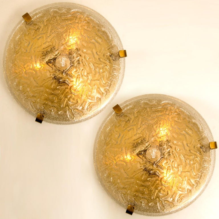 Clean lines to complement all decors. A pair of wonderful flush lights with brass detail and thick textured blown glass. Illuminates beautifully. 

Can also work for impressive wall lights. The stylish and clean elegance of this flushmounts suits