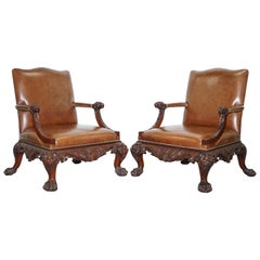 Pair of Thomas Chippendale Brown Leather Library Armchairs Hand-Carved Lions