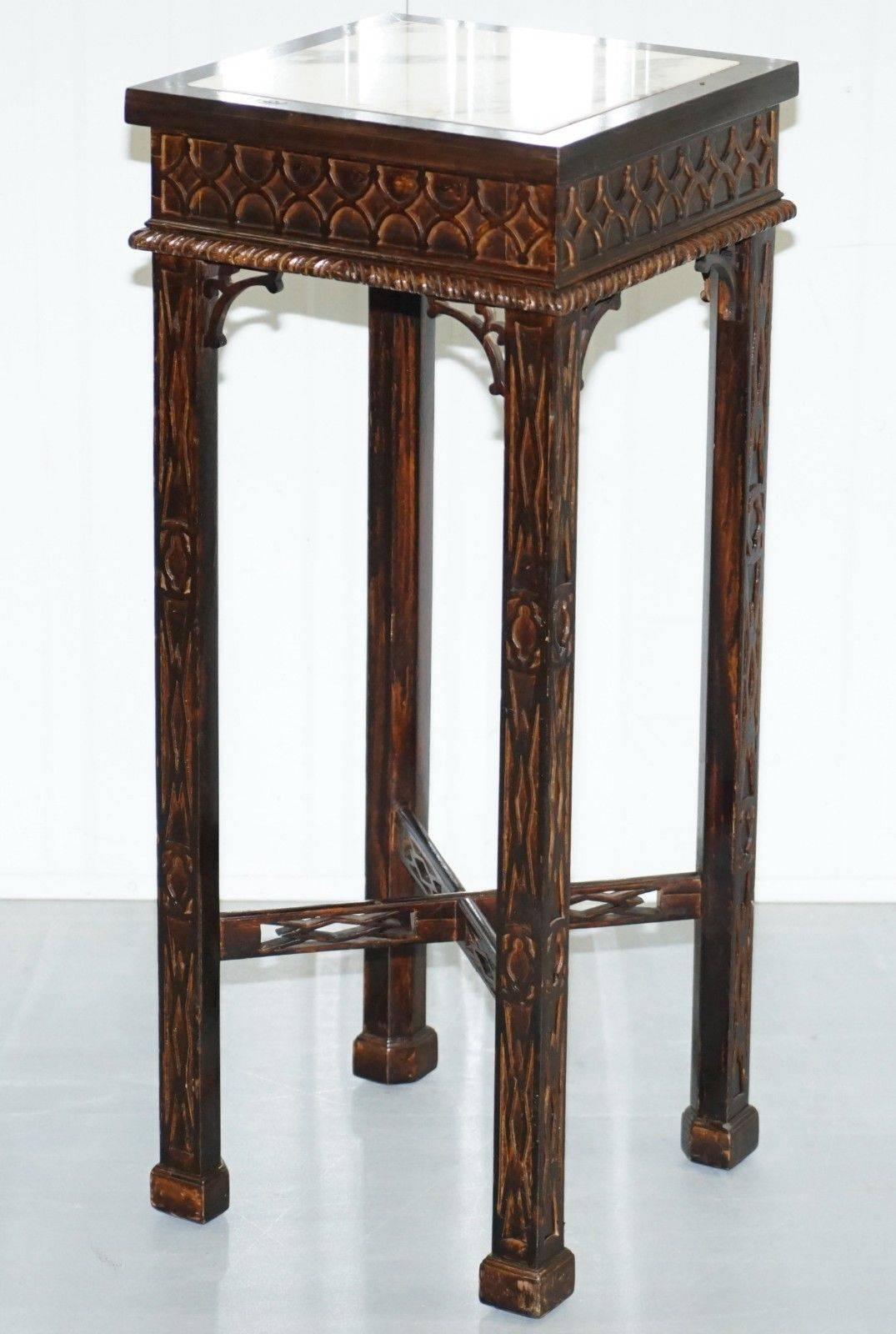 We are delighted to offer for sale this pair of Thomas Chippendale Chinese style carved wood marble topped display stands

A very famous style and design by Chippendale in the late 18th century, these are a revival version of the originals but