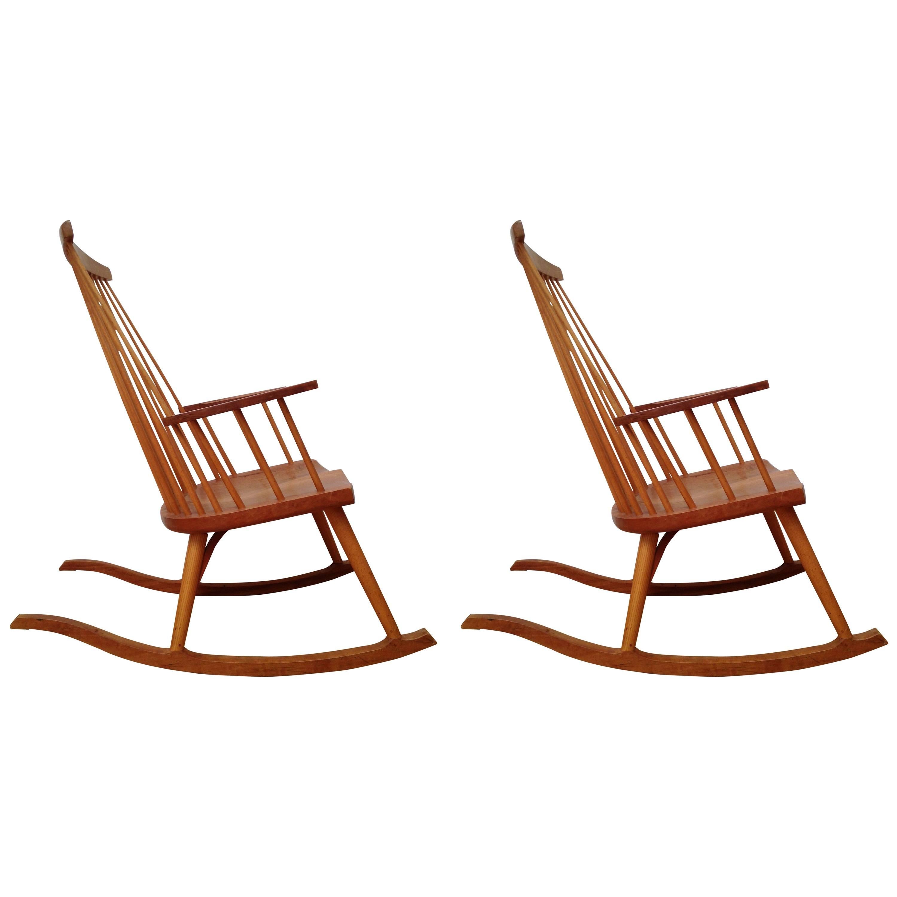 Beautiful pair of rocking chairs. Signed.